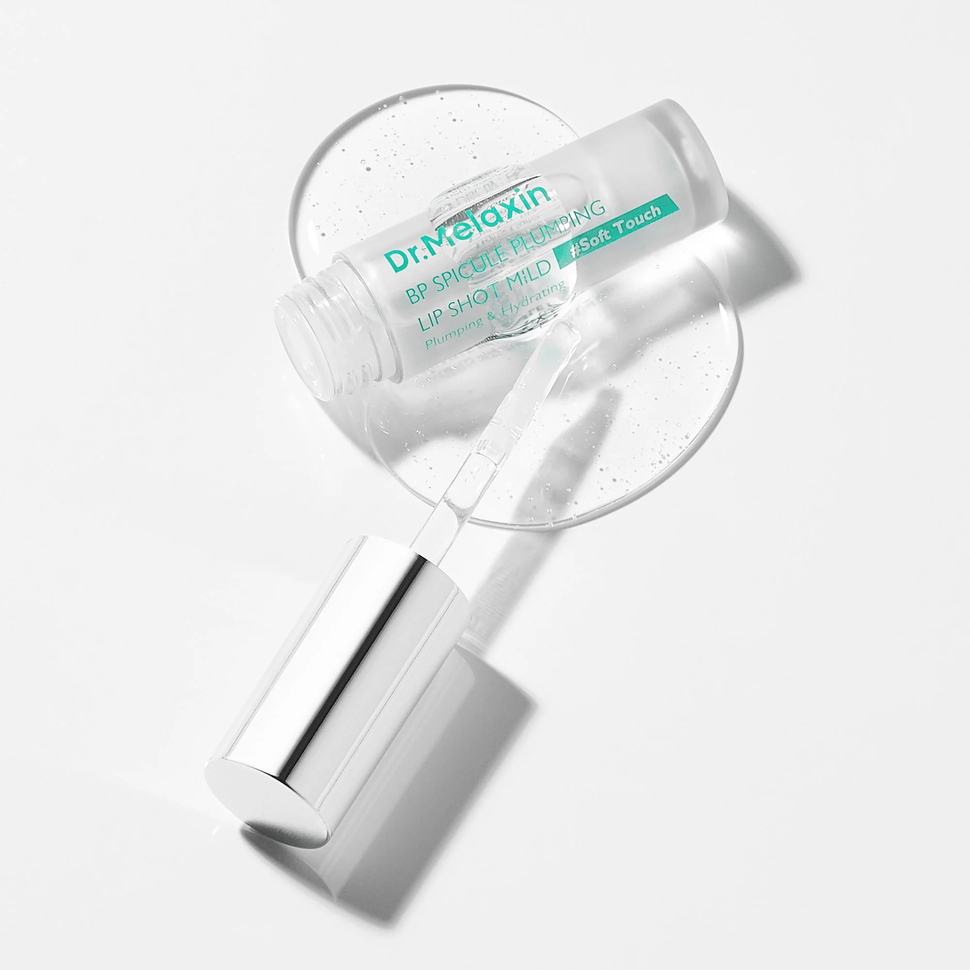 DR.MELAXIN BIO-SPICULE BP SPICULE PLUMPING LIP SHOT MILD Nawilżający błyszczyk do ust z delikatnym efektem powiększenia 4 ml - Image 3