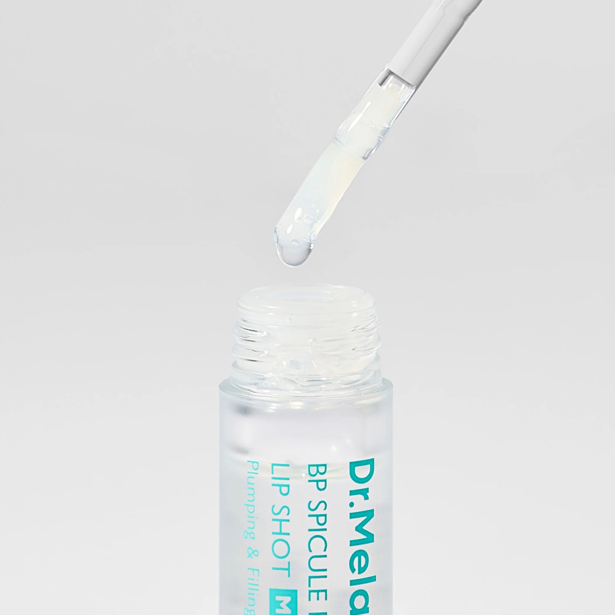 DR.MELAXIN BIO-SPICULE BP SPICULE PLUMPING LIP SHOT MILD Nawilżający błyszczyk do ust z delikatnym efektem powiększenia 4 ml - Image 4